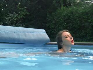 Swimming pool teen with big boobs Anastasia swimming naked