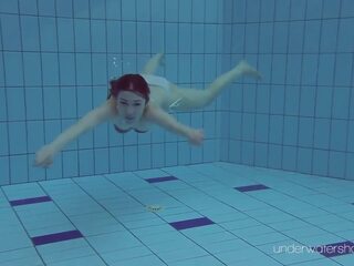 White swimsuit with tattoos – cutie Roxalana Cheh underwater