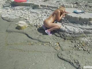 Awesome Kinky Nudist lassie on a Public Beach Dildo Ride