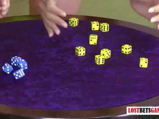 2 Busty blondes play a strip game of roll the dice