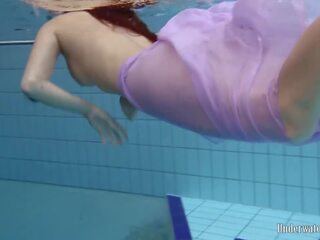 Enjoy Aneta in every pose in the pool