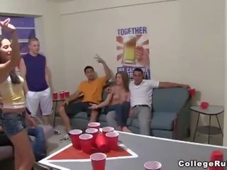 Strip beer pong at a crazy college party