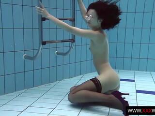 Underwater swimming seductress Vera Brass
