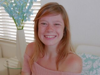 Attractive Teen Redhead with Freckles Orgasms During Casting