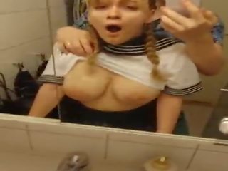 Busty young woman getting fucked in bathroom