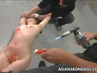 Asian prostitute has a waxing and spanking bdsm session