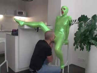 Exceptional teen in green catsuit
